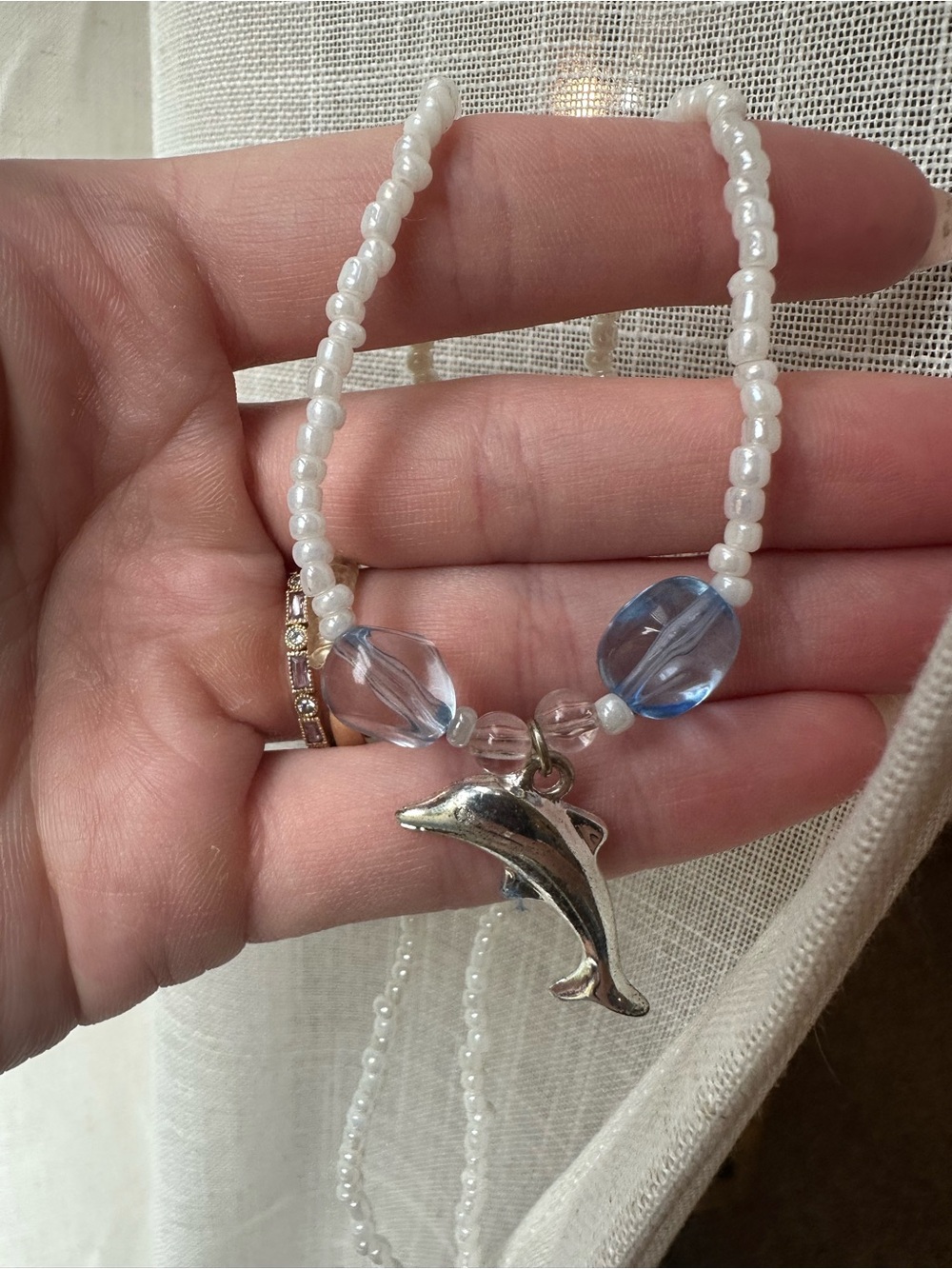 Vintage Bead Necklace with Silver Dolphin Charm and Blue Accents